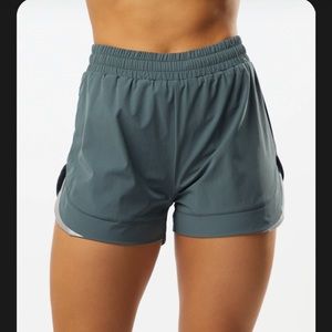 Woman’s Alphalete athletic shorts. Porcelain grey.